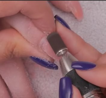 buff the nail to remove old polish