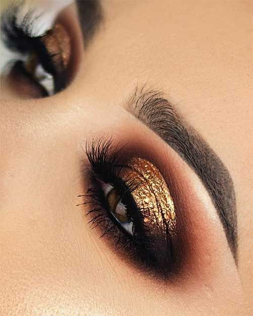 gold glitter eyes with green eyes with glitter liner