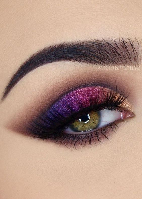 golden pink and purplish eye shadow with green eyes