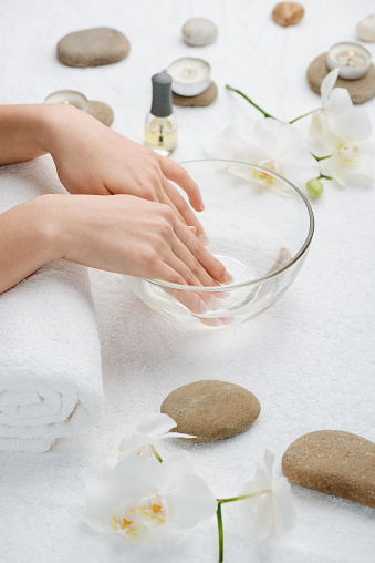 remove polygel nails with soaking fingertips in water