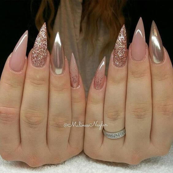 pointy nails with nude paint and shimmer art