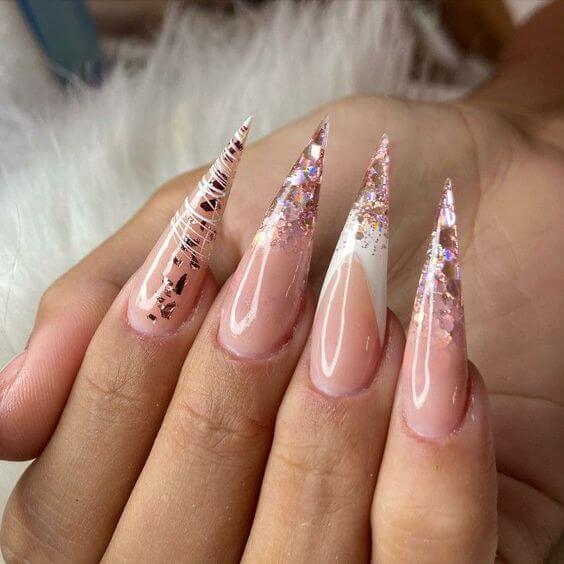 stiletto shaped nude pink with snowy flakes french design