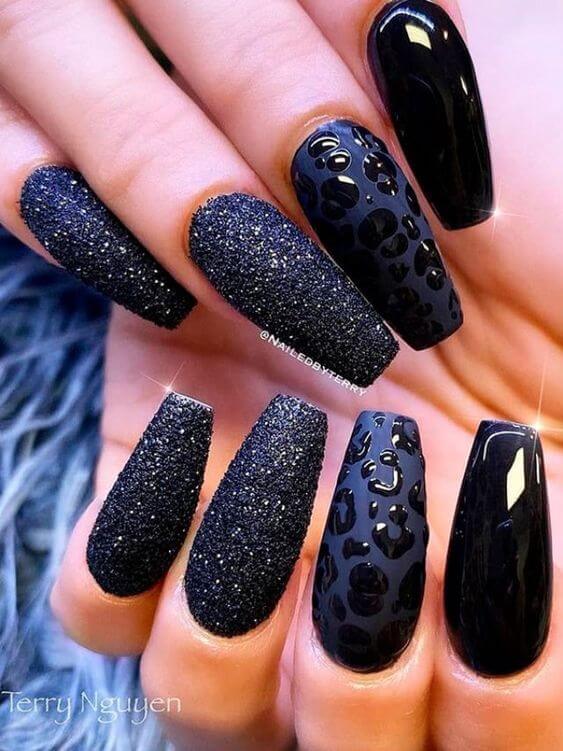 coffin shaped plain glittery and cheetah design black nails