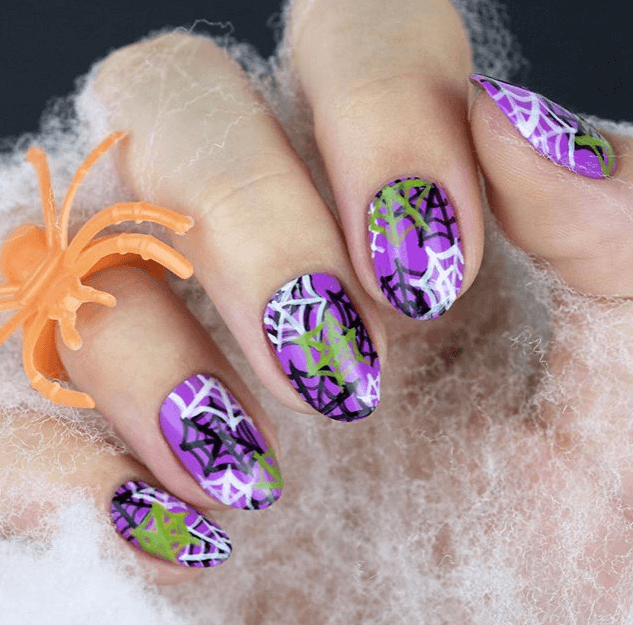 Frankenstein Nail Design with Violet, White, and Black Spider Web