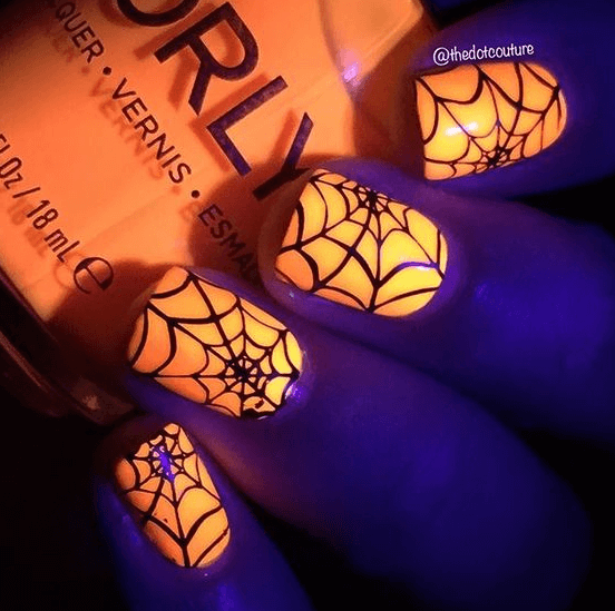 glow in the dark spider web nail art