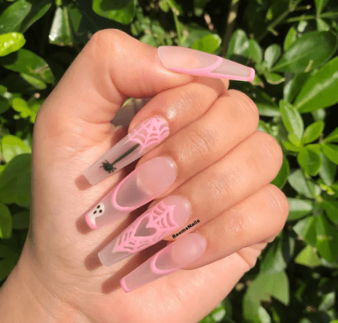 pink heart spider web nail idea