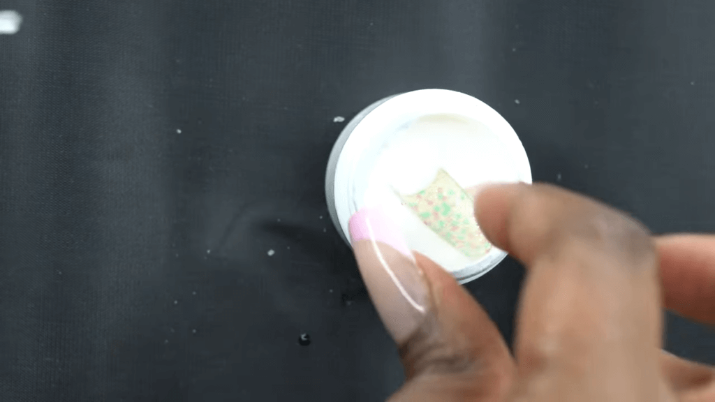 dip the fake nail in acrylic powder
